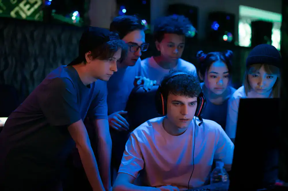 Development team reviewing game mechanics